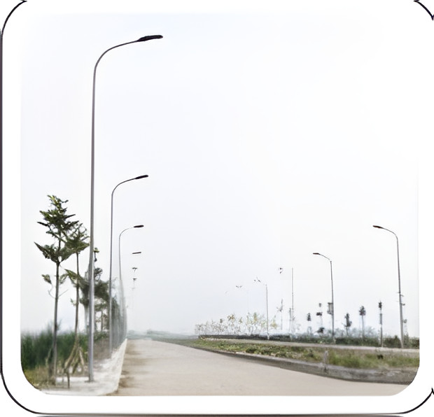 Hàng cột đèn liền cần dọc tuyến đường đô thị